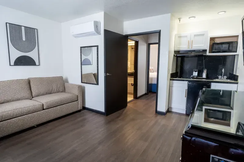 The Double Queen Suite Kitchenette at the Sands Inn &amp; Suites